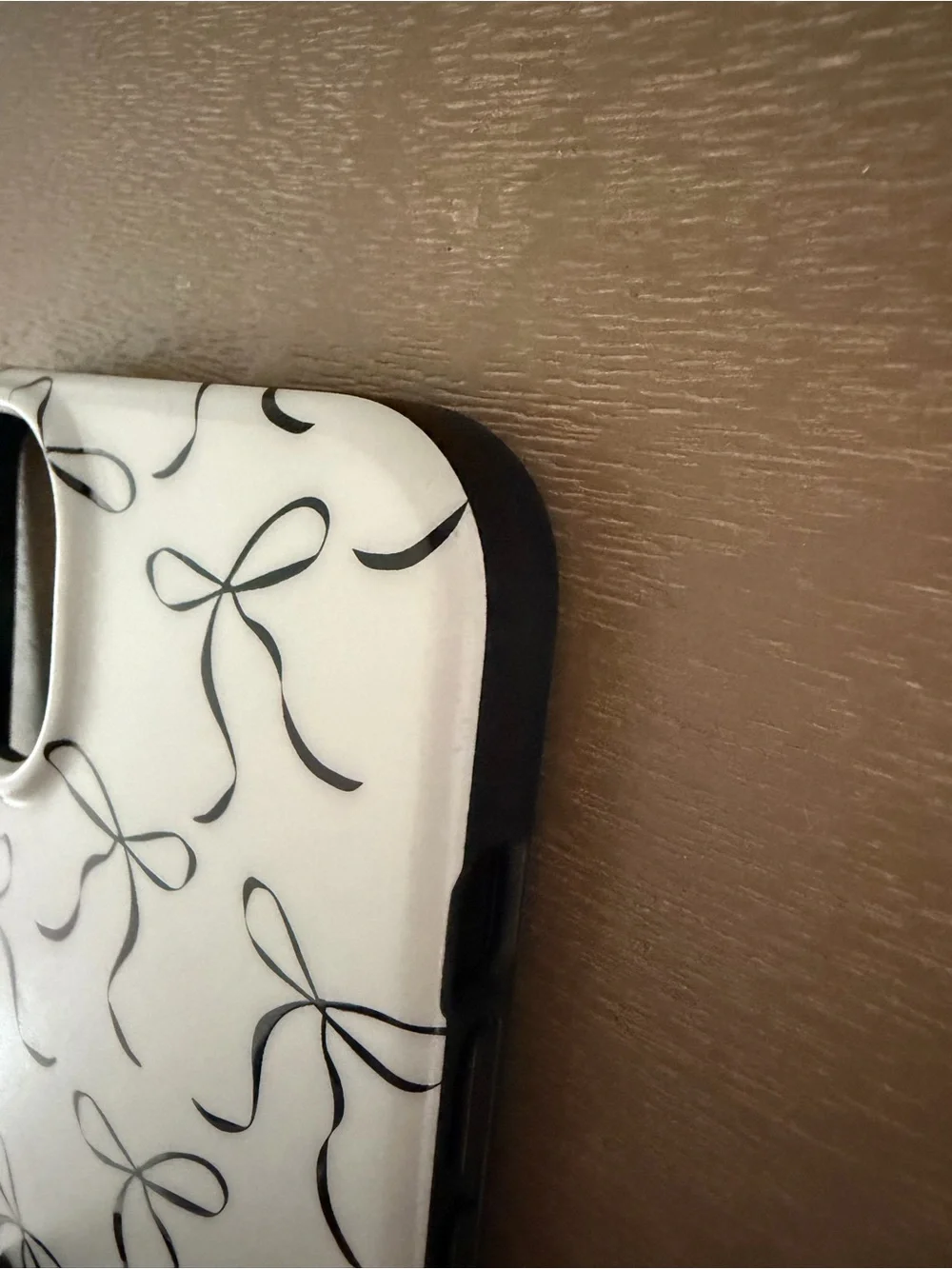 Loopy Case iPhone 14 Plus black and white bow phone case